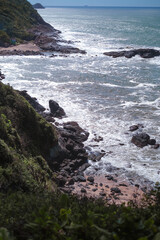 waves crashing on rocks