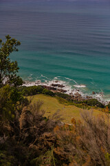 view towards a beach from the top of a mountain