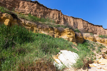 Landslide slope of mountain. Danger of rockfall, descent of stone avalanches. Mountain landscape of...