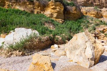Landslide slope of mountain. Danger of rockfall, descent of stone avalanches. Mountain landscape of...
