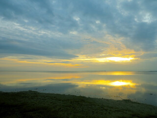 Authentic water landscape at sunset on a beautiful evening. Vityazevsky Liman, Krasnodar Territory, Russia