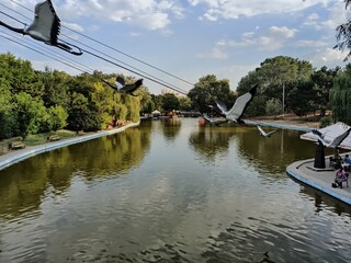 Decorative birds with a lake background
