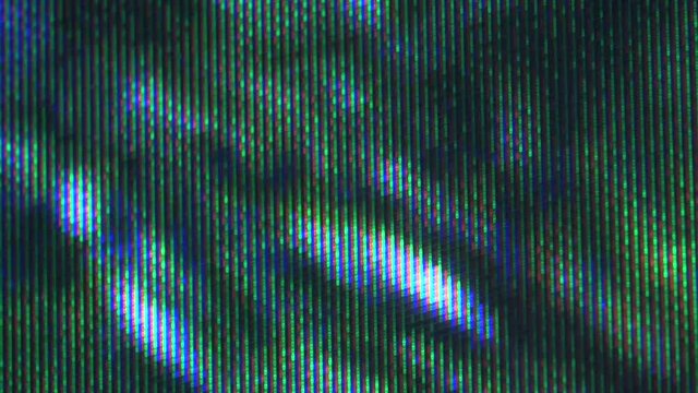 Close up view at a plasma tv while showing television activity