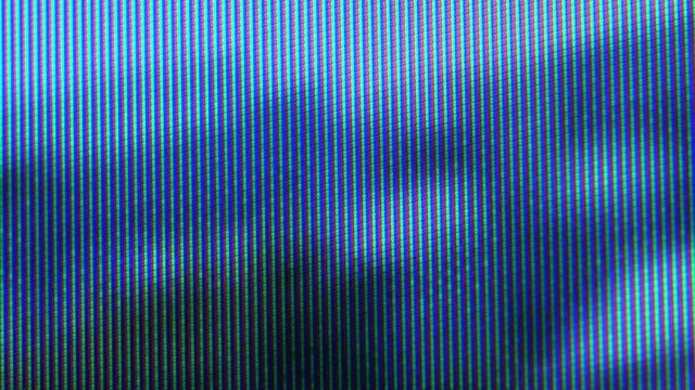 Close up view at a plasma tv while showing television activity