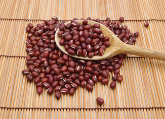 red beans in a wooden spoon