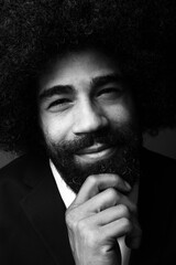 Beautiful afro man in front of a colored background