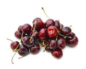 Handful of a red cherry on a white background