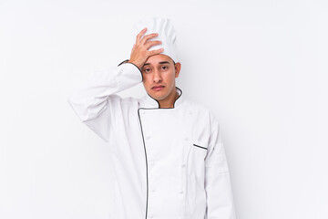 Young latin chef man isolated being shocked, she has remembered important meeting.