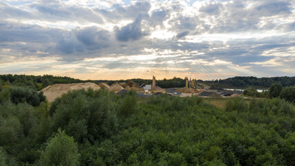 Fototapeta na wymiar aerial view on gravel pit with sunset