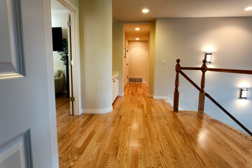 Newly installed oak floor boards for hallway in home