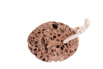 Pumice stone close up and copy space. Pumice stone isolated on white background. Beauty concept. Background for cosmetic product branding, identity and packaging inspiration.