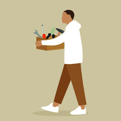 A man carries a tool box in his hands