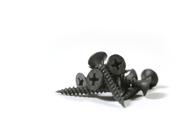 Black screws on a white background
