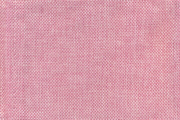 Natural texture of jute fabric for background. Pink jute linen