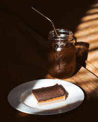 Iced Coffee and Brownie on a Plate