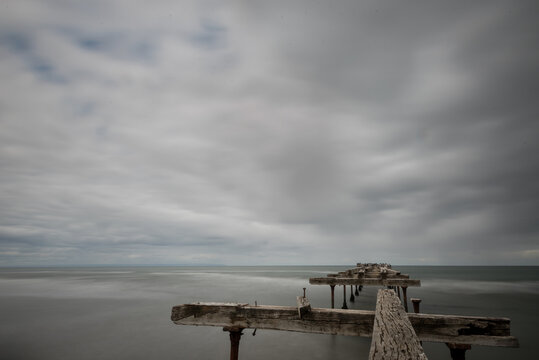 Long exposure of the Costanera in Punta Arenas, Chile, an abandoned dock and pier