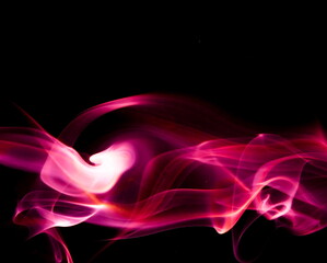 Red smoke on black background