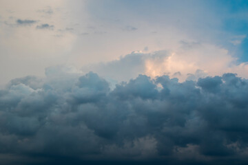Naklejka na ściany i meble Storm clouds, dramatic sky, nature background.