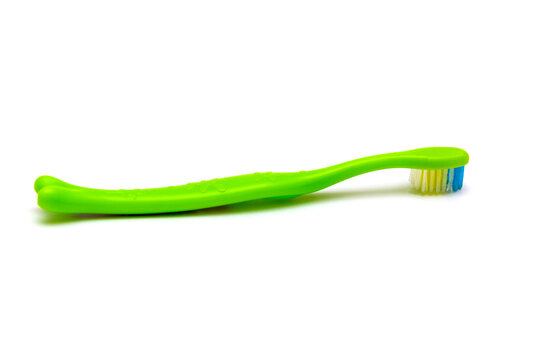 recommend clip art: White background on it toothbrushes of different colors are arranged in a chaotic manner oral hygiene isolate, brushing teeth