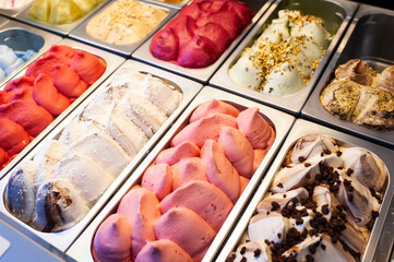 Great choice of ice cream. Italian gelateria. Ice-cream cafe, show window.