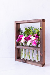 Floral arrangement in wooden box