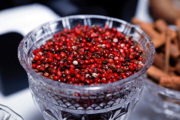 pink peppercorns in glass jar