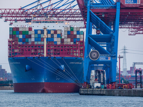 Hamburg, Germany: large cargo ship being loaded  at the cargo terminal 