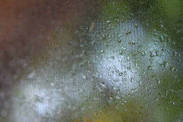 Raindrops On Clear Window Abstract Background