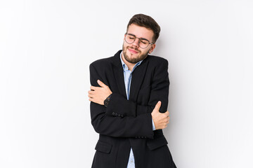 Young caucasian business man posing in a white background isolated Young caucasian business man hugs, smiling carefree and happy.