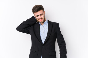 Young caucasian business man posing in a white background isolated Young caucasian business man suffering neck pain due to sedentary lifestyle.