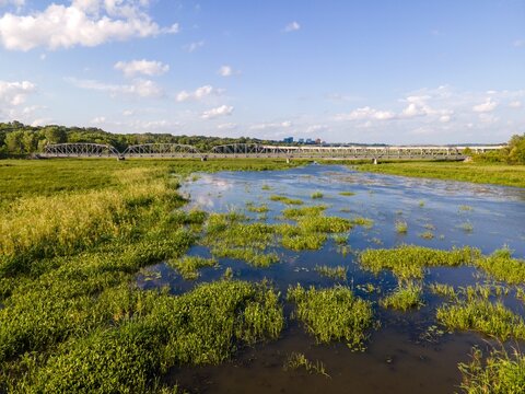 A Pedestrian Recreational Bridge Coming Through Wetlands South Of Minneapolis Minnesota