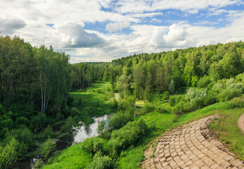 Hilly terrain and forest in central Russia. Sunny day, summer