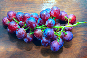 Tasty Grapes On Wooden Background 