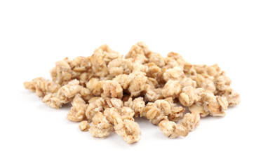 Heap of tasty crispy granola on white background