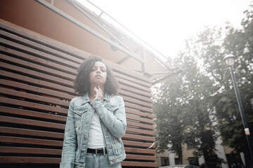 Fototapeta premium Black young pretty girl relaxing outdoor