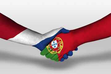 Handshake between portugal and netherlands flags painted on hands, illustration with clipping path.