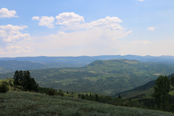 Naklejka premium clouds over the mountains