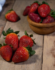 very healthy and riphealthy and ripe strawberries in bowlse strawberries