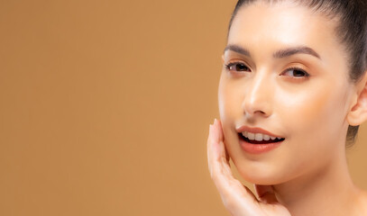 Beautiful woman with healthy skin with a brown background. Take care of your skin by spa course. Smile face