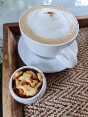 Top view of  hot coffee in white cup