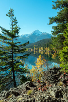 Snow Capped Mountains Above Gun Lake In British Columbia, Canada