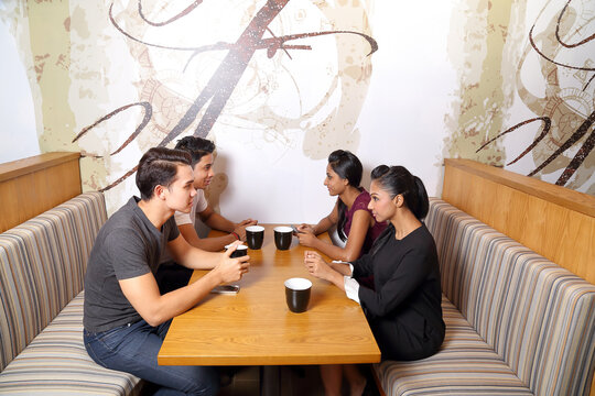 Group Of Asian Young Man Woman Friend Student Colleagues Talk Mingle Study Discuss Coffee Shop