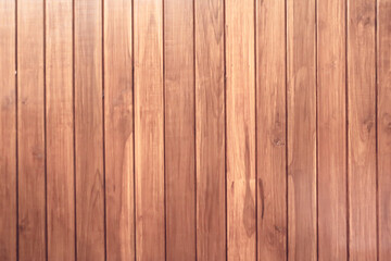 Old vintage red brown wood lath wall cladding for background and texture images.