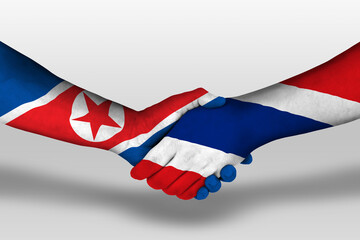 Handshake between thailand and north korea flags painted on hands, illustration with clipping path.