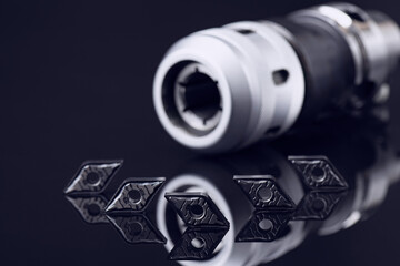 inserts positive rhombic cutting tool with hole. Coated, cermet for steel stainless cast iron....
