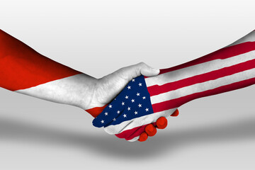 Handshake between united states of america and austria flags painted on hands, illustration with...