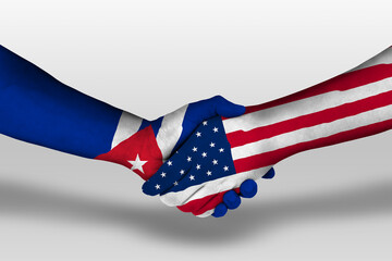Handshake between united states of america and cuba flags painted on hands, illustration with...