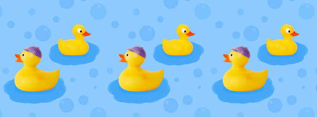 Pattern of yellow ducklings on a blue background.