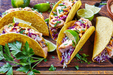 salmon tacos with shredded red cabbage salad