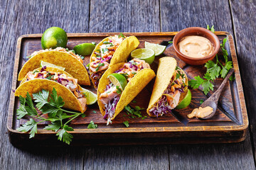 fish tacos with shredded red cabbage salad
